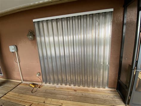 metal hurricane panels for my house|metal hurricane window shutters exterior.